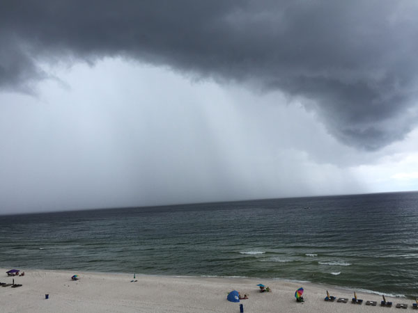 Healing Anxiety with Nature: dark cloud at the beach 