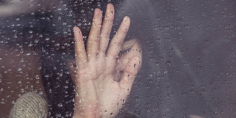 Spiritual Warfare | woman in rainy window
